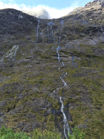Some snowmelt waterfalls coming down the cliffs.
