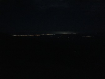 The lights of New Plymouth in the distance.