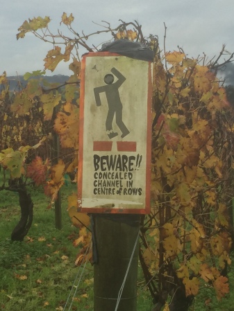 Awesomely gruesome caution sign at a north Auckland winery.